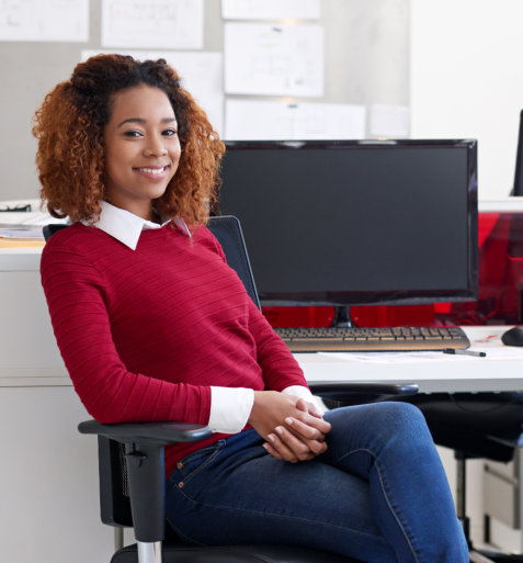 a woman sitting on the office